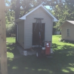 Setting shed on new concrete piers